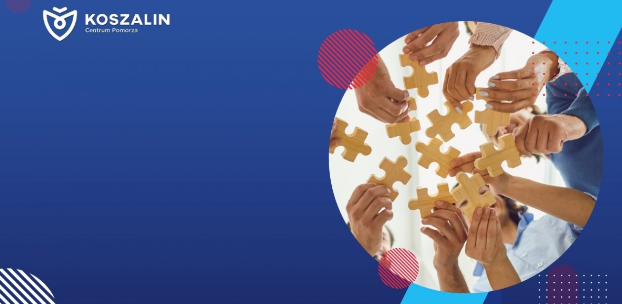 Na grafice znajdują się ludzie dokładający elementy puzzli