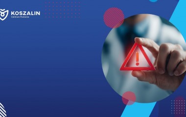 Na grafice znajduje się znak ostrzegawczy