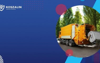 Na grafice znajduje się śmieciarka.